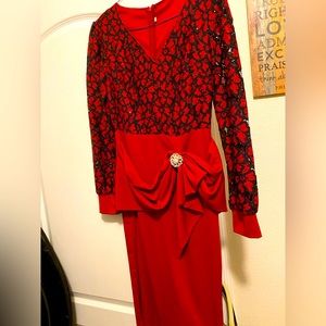 Red dress with silver broche, side tie